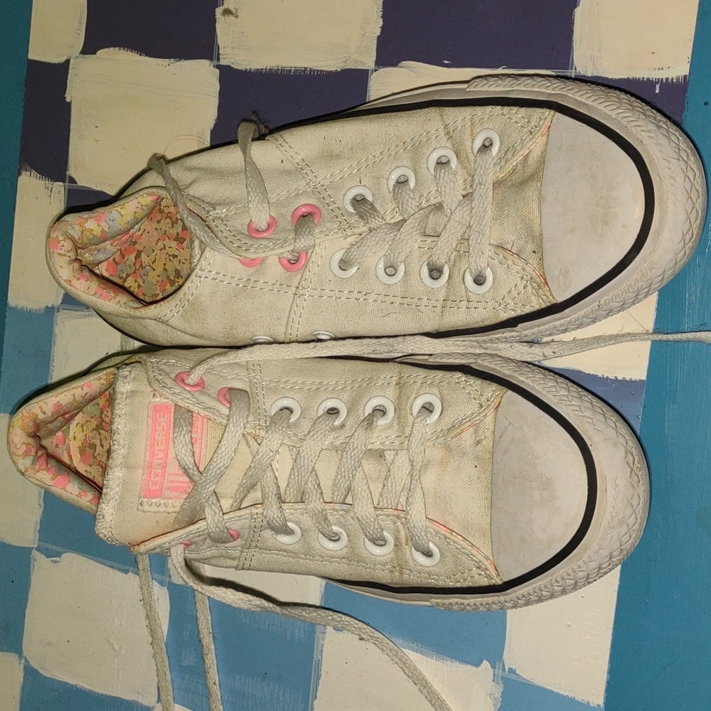 White Converses with pink floral design inside